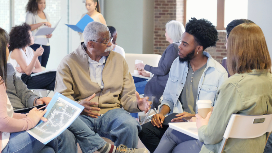 Man speaking with youth